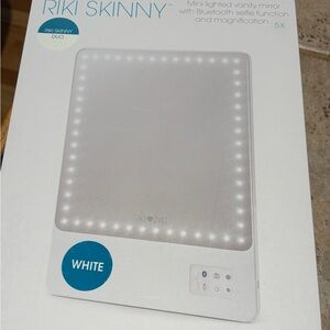Riki Skinny Vanity Mirror 5x magnifying mirror, cellphone holder, Bluetooth